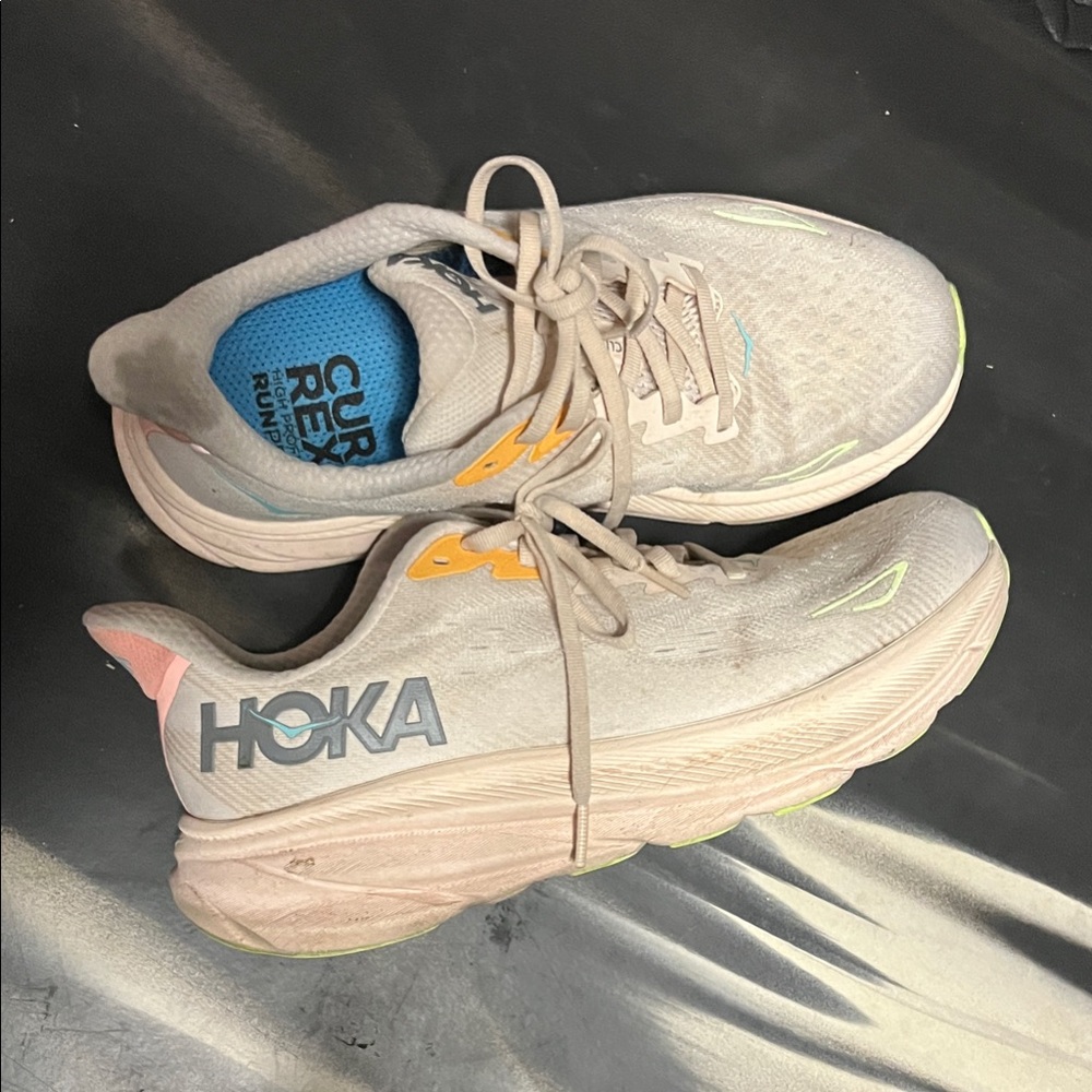 Hoka Clifton 9 in Cream with Blue and Yellow Accents